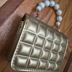 Gold mini purse